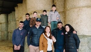 The members of the Proud Farm group, brimming with pride. Nikolaos Koltsidas, the president, proudly wears the group’s cap.