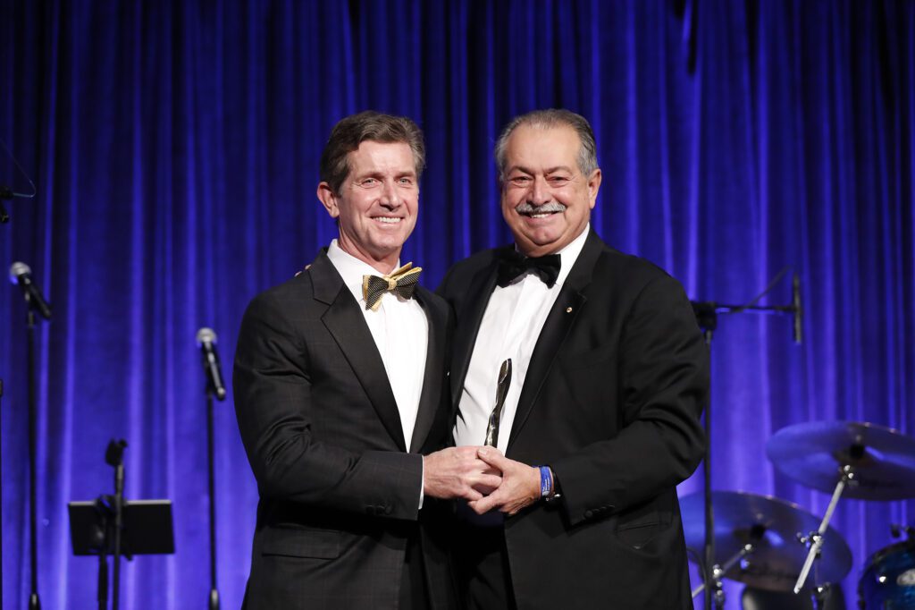 Alex Gorsky, Chairman of the Board and CEO of Johnson & Johnson, is honored with the Prometheus Award, by Andrew N. Liveris, The Hellenic Initiative Chairman.